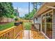 Outdoor deck featuring flower boxes, a sliding glass door, and a fenced backyard at 2200 Wyman Pl, Durham, NC 27707