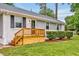 Charming home showcasing a grey and white color scheme and updated porch at 2200 Wyman Pl, Durham, NC 27707