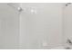 All white tiled walls around a shower space at 231 Heather Bluffs Dr, Garner, NC 27529