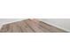 Close up of newly installed wood-look flooring at 231 Heather Bluffs Dr, Garner, NC 27529