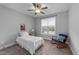 Bedroom with plush carpet, a ceiling fan, and a window with a view at 2500 Plowridge Rd, Fuquay Varina, NC 27526