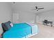 Comfortable bedroom featuring modern ceiling fan, dedicated desk area, and soft, neutral carpet at 2500 Plowridge Rd, Fuquay Varina, NC 27526