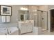 Bathroom featuring a separate tub, shower, single vanity and linen closet at 2972 Hanging Valley Way, Wake Forest, NC 27587