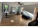 Spacious room with beautiful wood floors, ceiling fan, desk and natural light at 306 Roebling Ln, Cary, NC 27513