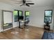 Bright room with beautiful wood floors, ceiling fan, desk and natural light at 306 Roebling Ln, Cary, NC 27513