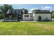 Spacious backyard with a combination of green and neutral siding, offering privacy at 316 Barbour St, Clayton, NC 27520