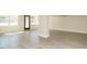 Spacious basement featuring neutral walls and wood floors with natural light throughout at 316 Barbour St, Clayton, NC 27520