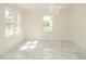 Bright bedroom with large windows that provide ample natural light and a view of the yard at 316 Barbour St, Clayton, NC 27520