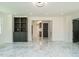 Spacious living room features marble floors, built-in shelves, and modern lighting at 316 Barbour St, Clayton, NC 27520