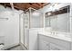 Basement bathroom featuring a glass enclosed shower and vanity with white cabinets at 3210 Merriman Ave, Raleigh, NC 27607