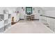 Bright bonus room featuring neutral carpet, large storage cubes, and a whimsical collection of toys and books at 3210 Merriman Ave, Raleigh, NC 27607