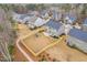 Aerial view of fenced in backyard including playset at 329 Royal Delta Dr, Cary, NC 27519
