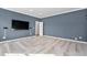 Spacious bedroom featuring plush carpeting, painted walls, and large doorway at 329 Royal Delta Dr, Cary, NC 27519