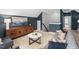 Open-concept living area features comfortable seating, stylish furnishings, and plenty of natural light, perfect for relaxation at 329 Royal Delta Dr, Cary, NC 27519