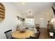 Open floor plan featuring a living and dining area, hardwood floors, and natural light at 365 Red Elm Dr, Durham, NC 27713