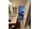 Bathroom with a vanity and toilet, with a partial view into the Primary bedroom at 3713 Coach Lantern Ave Ave, Wake Forest, NC 27587