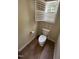 Cozy powder room featuring toilet and window at 3713 Coach Lantern Ave Ave, Wake Forest, NC 27587