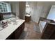 Main bathroom with garden tub, tiled shower, and large vanity at 3713 Coach Lantern Ave Ave, Wake Forest, NC 27587