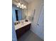 Bathroom view of the vanity, mirror, lighting, and towels hanging at 3713 Coach Lantern Ave Ave, Wake Forest, NC 27587