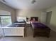 Bedroom featuring two twin beds, a window with blinds, and neutral walls at 3713 Coach Lantern Ave Ave, Wake Forest, NC 27587