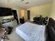 Spacious bedroom features a large bed, dresser, and a walk-in closet at 3713 Coach Lantern Ave Ave, Wake Forest, NC 27587