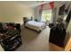 Bedroom with carpet floors, neutral paint and ample natural light at 3713 Coach Lantern Ave Ave, Wake Forest, NC 27587