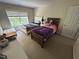 Bedroom with two beds and a large window, white bench and a white dresser at 3713 Coach Lantern Ave Ave, Wake Forest, NC 27587