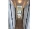 Hallway view to ensuite bathroom with soaking tub at 3713 Coach Lantern Ave Ave, Wake Forest, NC 27587