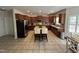 Well-equipped kitchen featuring custom cabinets, a central island, and modern appliances for the home chef at 3713 Coach Lantern Ave Ave, Wake Forest, NC 27587