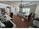 Bright office featuring hardwood floors, a chandelier, and a comfortable daybed at 3713 Coach Lantern Ave Ave, Wake Forest, NC 27587