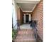 Inviting front porch with decorative columns, seating, and a 'Welcome' sign for a warm entrance at 3713 Coach Lantern Ave Ave, Wake Forest, NC 27587
