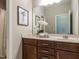 A bright bathroom with a large mirror and stylish decorations at 437 Henmore Brook Dr Dr, Cary, NC 27519