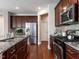 Modern kitchen with stainless steel appliances, granite countertops, and ample cabinet space at 437 Henmore Brook Dr Dr, Cary, NC 27519