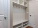 Mudroom with built in bench, storage, and coat hooks at 437 Henmore Brook Dr Dr, Cary, NC 27519