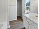 Bright bathroom with ample storage, vanity, and well-lit space at 4509 Cobble Creek Ln, Raleigh, NC 27616
