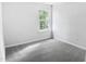 Light-filled bedroom with neutral carpet, offering a serene and comfortable space at 4509 Cobble Creek Ln, Raleigh, NC 27616