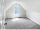 Versatile bonus room with a dormer window, perfect for a home office or playroom at 4509 Cobble Creek Ln, Raleigh, NC 27616