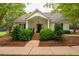 Exterior of clubhouse with landscaped garden, inviting atmosphere, and classic design at 507 Vatersay Dr, Apex, NC 27502