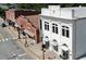 Aerial shot of commercial buildings along the street with available parking and retail spaces at 507 Vatersay Dr, Apex, NC 27502