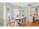 Charming breakfast nook with hardwood floors and a view of the outdoors at 671 Bear Tree Crk, Chapel Hill, NC 27517