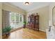 Cozy office space featuring hardwood floors, natural light, built in hutch, and elegant decor at 671 Bear Tree Crk, Chapel Hill, NC 27517