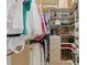 Organized walk-in closet showcasing custom shelving, drawers, clothing rods, and plenty of storage space at 671 Bear Tree Crk, Chapel Hill, NC 27517