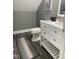 This bathroom features modern vanity, neutral colors, and tile flooring at 6916 Morrow Mill Road, Chapel Hill, NC 27516