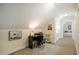 Bonus room with desk, wood floors and natural light coming in from nearby window at 6916 Morrow Mill Road, Chapel Hill, NC 27516