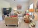 Bright and cozy living room with neutral furniture, decorative accents, and ample natural light at 6916 Morrow Mill Road, Chapel Hill, NC 27516
