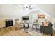 A cozy living room featuring vaulted ceilings, neutral colors and a comfortable seating arrangement at 6916 Morrow Mill Road, Chapel Hill, NC 27516
