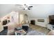 This spacious living room features vaulted ceilings, natural light, and is perfect for Gathering fun and relaxation at 6916 Morrow Mill Road, Chapel Hill, NC 27516