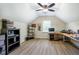 A spacious office features a workstation and a large window that provides ample natural light at 6916 Morrow Mill Road, Chapel Hill, NC 27516