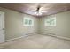 Bedroom with a ceiling fan and a unique cloud-themed ceiling design, offering a serene and airy feel at 712 Beaver Dam Rd, Raleigh, NC 27607