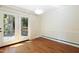 Bright dining room with hardwood floors and access to the outdoor deck at 712 Beaver Dam Rd, Raleigh, NC 27607